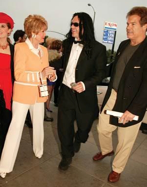 Here's Tommy Wiseau with Kat and her mother at the premiere of The Room