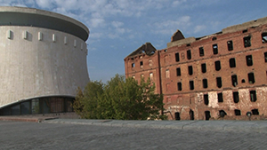 A heavily damaged and exposed large building 
from the battle.