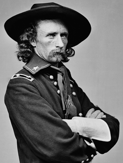 photo of George Armstrong Custer in his military uniform.