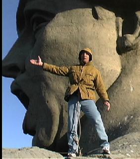 This is a photo of me standing by the head 
of the 'Motherland Calls' statue.